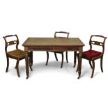 A Regency rosewood library table, the rectangular leather inset top over opposing shallow frieze
