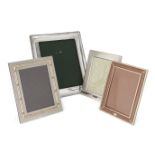 Three various Gucci photo frames, all with easel backs, the designs including a gilt metal and