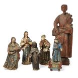 A group of six Spanish colonial carved Santos figures, 18th/19th century, to include: a large carved