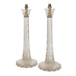 A pair of large cut glass table lamps, late 20th century, the tapering heptagonal shafts