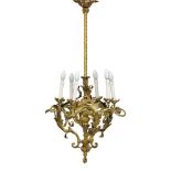 A French gilt-bronze six-light chandelier, first half 20th century, the openwork cage cast with