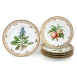 Four Royal Copenhagen 'Flora Danica' plates, 20th century, each decorated to centre with fruit on