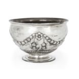 A Victorian silver rose bowl, London, 1886, Charles Stuart Harris, the rounded body repousse