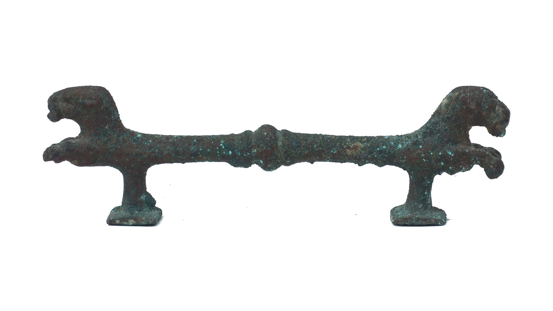 A Luristan bronze zoomorphic handle, circa 700BC, adorned with two lions heads terminals, with their