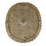 A Qajar silver inlaid brass mirror case, Iran, late 19th century, of cusped, oval form, the mirror