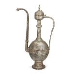 A large tinned copper Qajar ewer, Iran, 19th century, of baluster form, on a spreading foot, the
