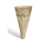 A Roman green glass conical lamp, circa 4th-5th century A.D., clear glass with original lot sticker,