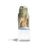 A Late period Egyptian faience amulet of a goddess, wearing a uraeus, fragmentary: torso and head