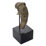 A Roman bronze finger, a ring in raised relief, some traces of gilding remain above the ring band,