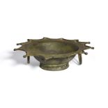 A Byzantine bronze basin with two handles and scalloped rim, Eastern Mediterranean, 6th century,