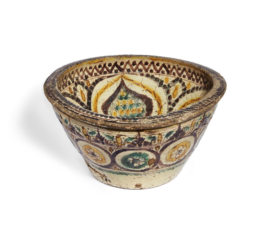 A large North African pottery bowl, probably Morocco or Tunisia, late 18th-early 19th century, the