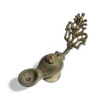 A Roman bronze oil lamp with elaborate open work handle of a palmette with dolphins, the lid cast