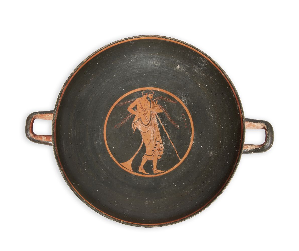 A Greek style stemmed red-figure pottery kylix, enlivened with some gilding, the exterior