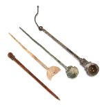 Three Roman spoons, including a silver strainer spoon, with turned handle and loop for attachment,