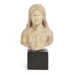 A Roman marble bust of Isis, circa 1st Century A.D., the wavy hair with central parting, falling