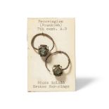 A pair of Merovingian openwork hollow bronze hexagonal earrings, four faces with raised diamond-