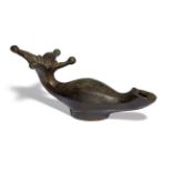 A Roman bronze oil lamp with open petalled funnel handle and ovoid body, 19.8cm long 7.3cm high