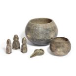 Six schist and steatite items, including two schist spherical bodied vessels, one with concentric