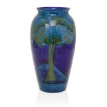 William Moorcroft (1872-1945), a Moonlit Blue pattern ceramic vase, c.1925, signed W Moorcroft in