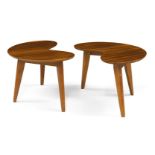 A pair of teak kidney shaped side tables, c.1950, The shaped tops on splayed and tapered birch