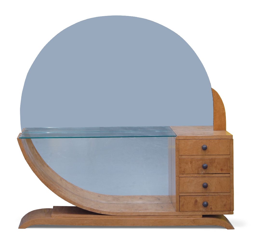 An Art Deco style satin birch dressing table, 20th Century, With circular mirror and glazed shelf,