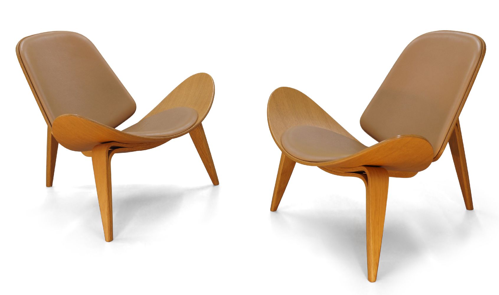 Hans Wegner (Danish 1914-2007), a pair of 'CH07' shell chairs and two ottomans for P.P Mobler, 2005,