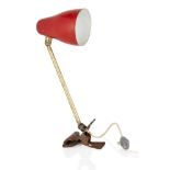 Giuseppe Ostuni (Italian), a desk lamp for Oluce, c.1950, With domed adjustable red enamelled shade,