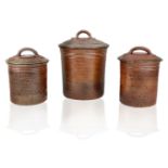 Peter Starkey (British b.1945), three stoneware lidded jars, c.1980, each impressed with potter's