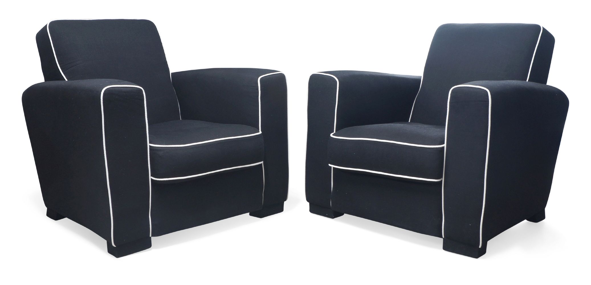A pair of Art Deco club armchairs, possibly by Jacques Adnet, c.1940/50, Upholstered in black fabric