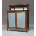 An Edwardian mahogany chiffonier, the top with raised mirrored back surmounted by a shelf on cluster