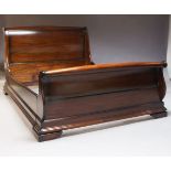 A mahogany double sleigh bed, late 20th century, 225cm long x 158cm widePlease refer to department