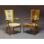 A pair of Louis XVI style giltwood fauteuils, early to mid 20th Century, with tapered backrests,