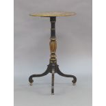 A Victorian wine table, floral decoupage oval top, raised on parcel gilt ebonized support and