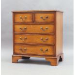 A pair of Georgian style mahogany chests, early to mid-20th century, two short over three long