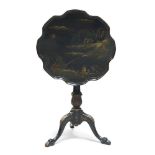 A George III style ebonised chinoiserie tilt-top tripod table, late 19th century, the top