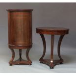 A continental mahogany and and inlaid cylindrical cabinet, late 20th Century, with single cupboard