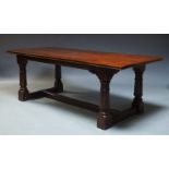 A large mahogany refectory table, late 20th century, the rectangular top above substantial turned