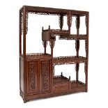 A Chinese jichimu and huali table top cabinet, late Qing dynasty, the asymmetric design with