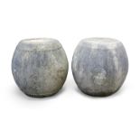 A pair of Chinese stone 'barrel' stools, Ming dynasty, 16/17th century, carved in low relief with