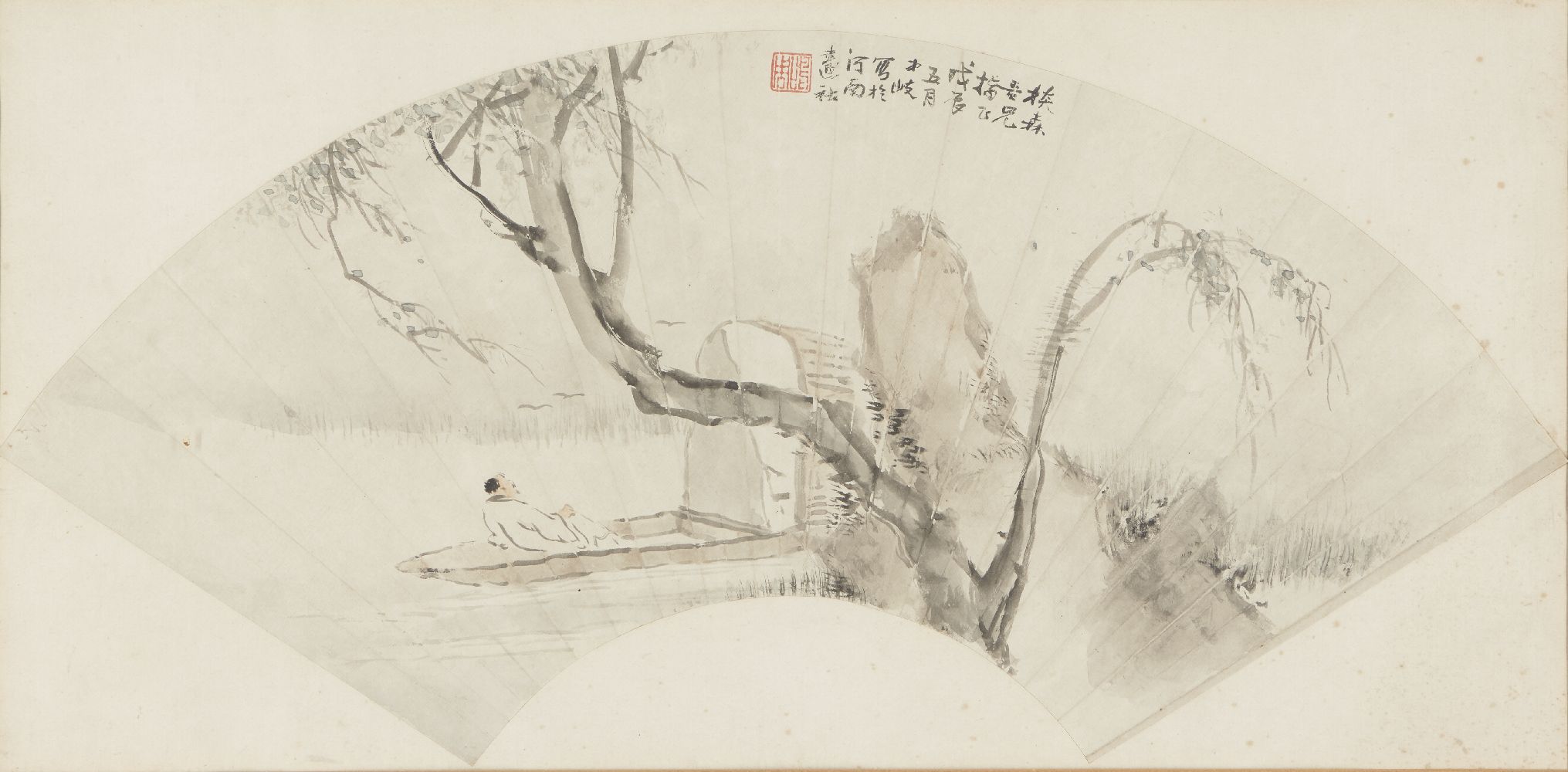 CUI QI (Chinese, 1841-1915), ink and colour on paper fan, study of a man reclining on a boat in a