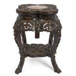 A Chinese hardwood quatrilobe marble inset jardiniere stand, late 19th century, the rouge marble