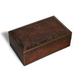 A Chinese burlwood box, 19th century, of rectangular form with faceted lid, 24.5cm long