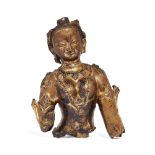 A Chinese gilt bronze fragmentary figure of Parvati, 18th/19th century, cast with her hair in a