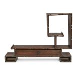 A Chinese wood table top display stand, late Qing/ Republic period, with a single frieze drawer,