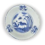 A Chinese porcelain blue and white kosometsuke 'bird' dish, Tianqi period, the interior painted with