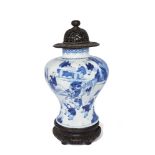 A Chinese porcelain blue and white 'hundred boys' baluster vase, Kangxi period, painted with