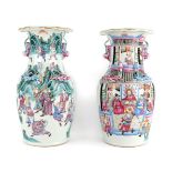 A pair of Chinese Canton porcelain famille rose vases, mid-19th century, the exteriors with