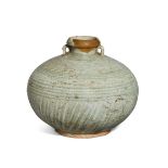 A Thai Sawankhalok stoneware celadon-glazed jar, 15th century, of slightly-compressed globular