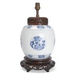 A Chinese porcelain blue and white 'medallion' jar, Kangxi period, painted with floral medallions to