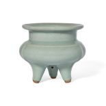 A Chinese Longquan celadon tripod censer, late Qing dynasty, the compressed globular body with a